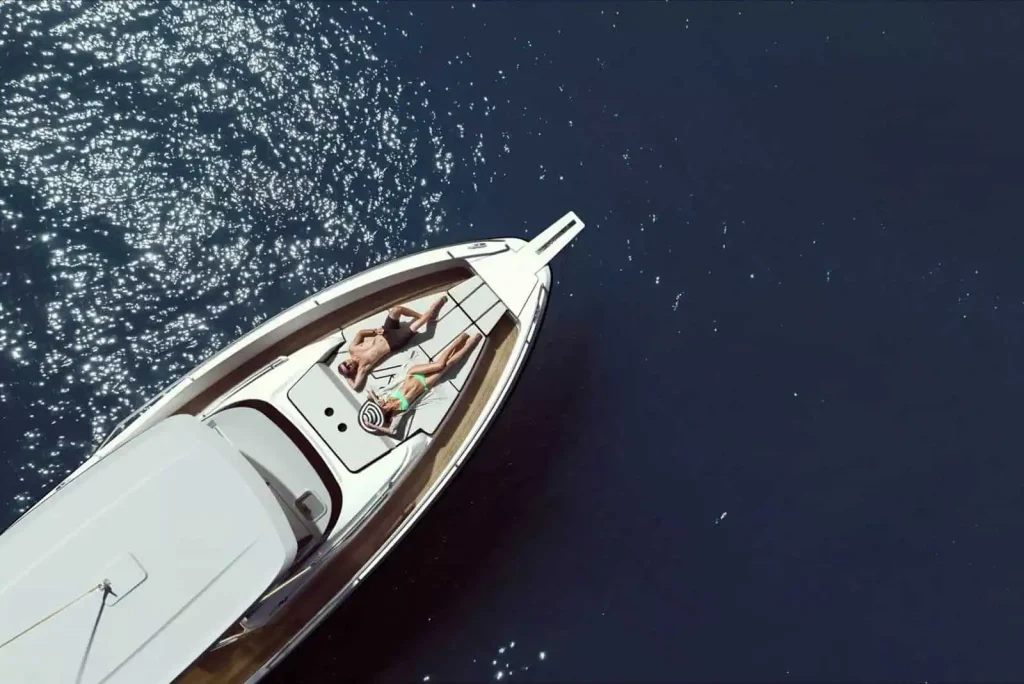 Luxury boat rental in Ibiza sailing through turquoise Mediterranean waters